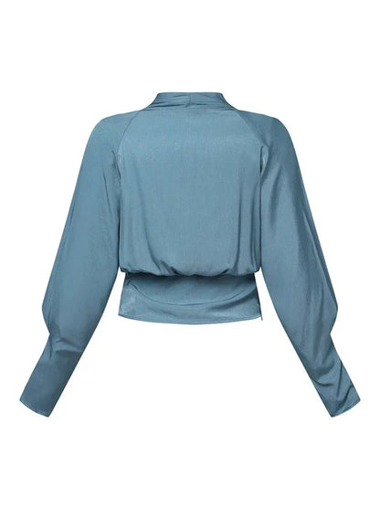 NEVINA | V-Hals Blouse met Pofmouwen en Gecentreerde Taille